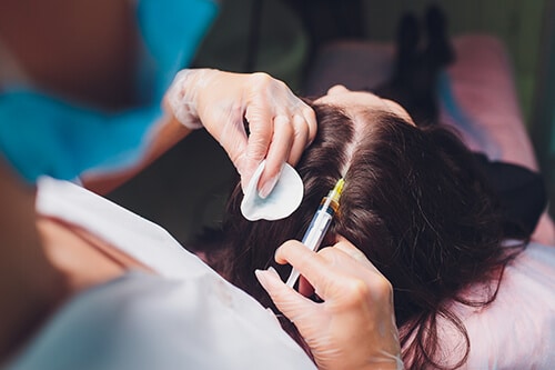 Platelet rich plasma injection procedure. Hair growth stimulation. PRP therapy process.
